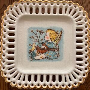 Porcelain reticulated trinket dish with medieval figure Dish
